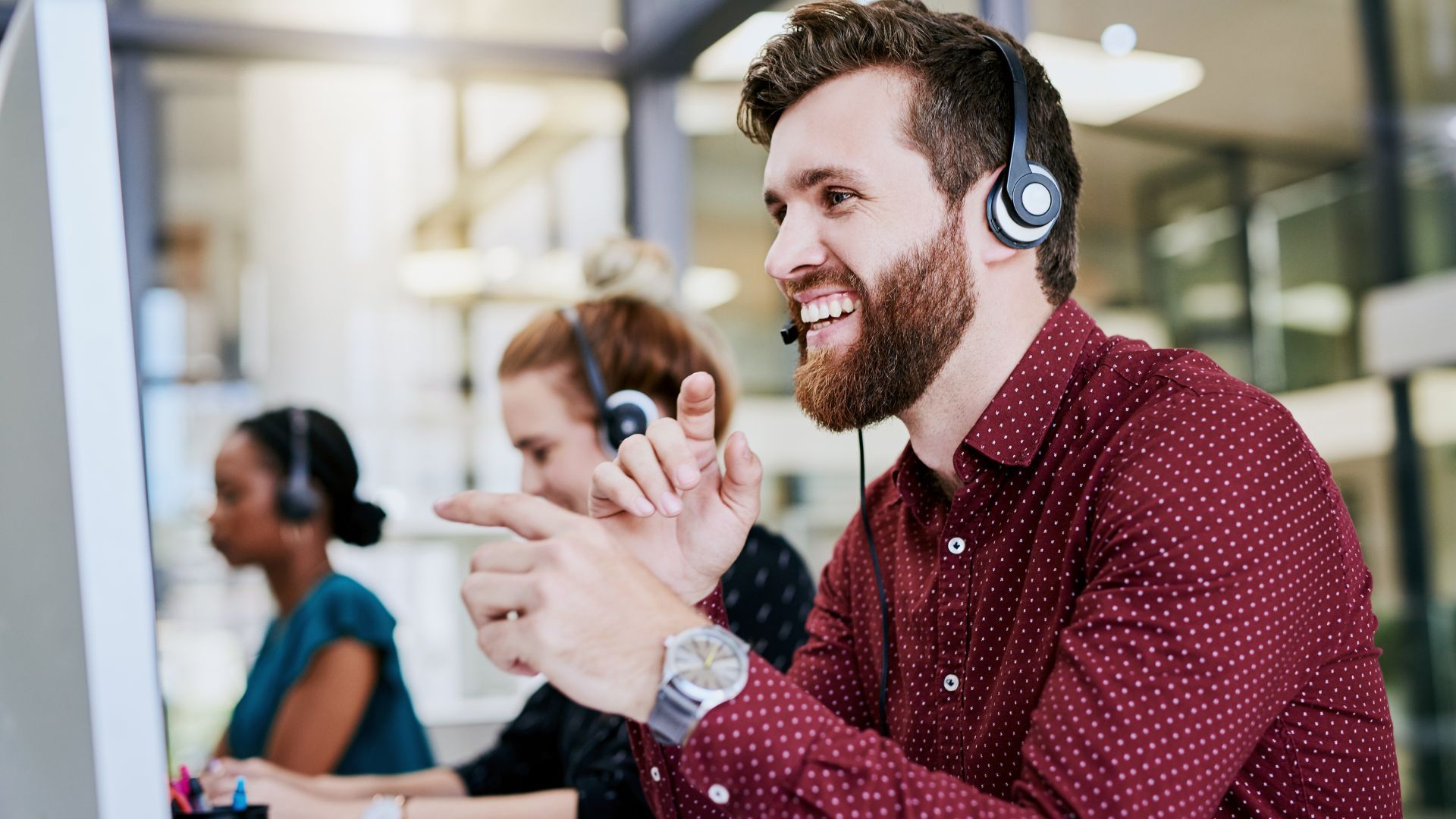 Image of a male customer service rep at a SaaS business