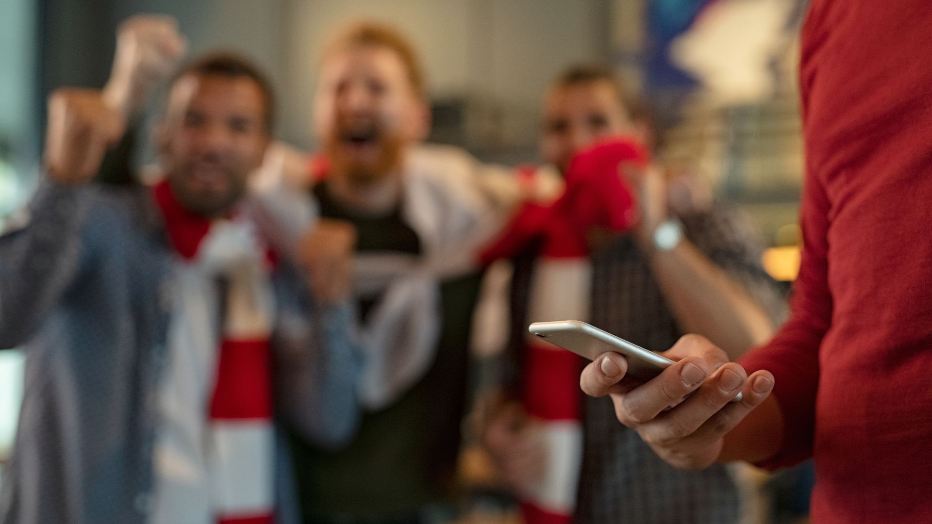 Group of friends connecting over sports betting