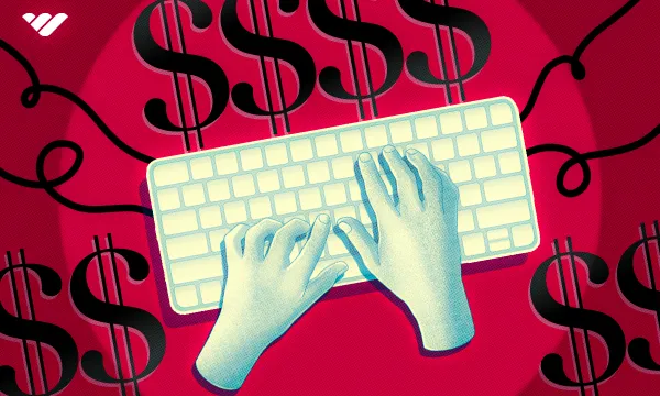 hands on keyboard with dollar signs 